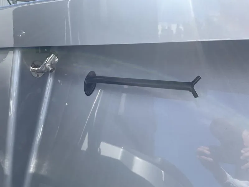 Slide: The Image of 2020 Stuart 27 CC boat detail with metal fitting and protruding rod. - 28