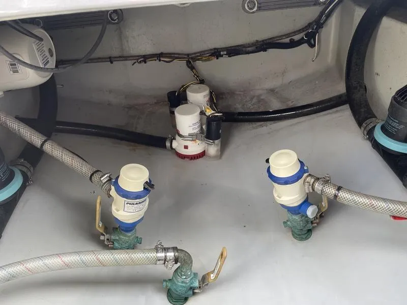 Slide: The Image of Bilge area of 2020 Stuart 27 CC boat with hoses and fittings. - 37