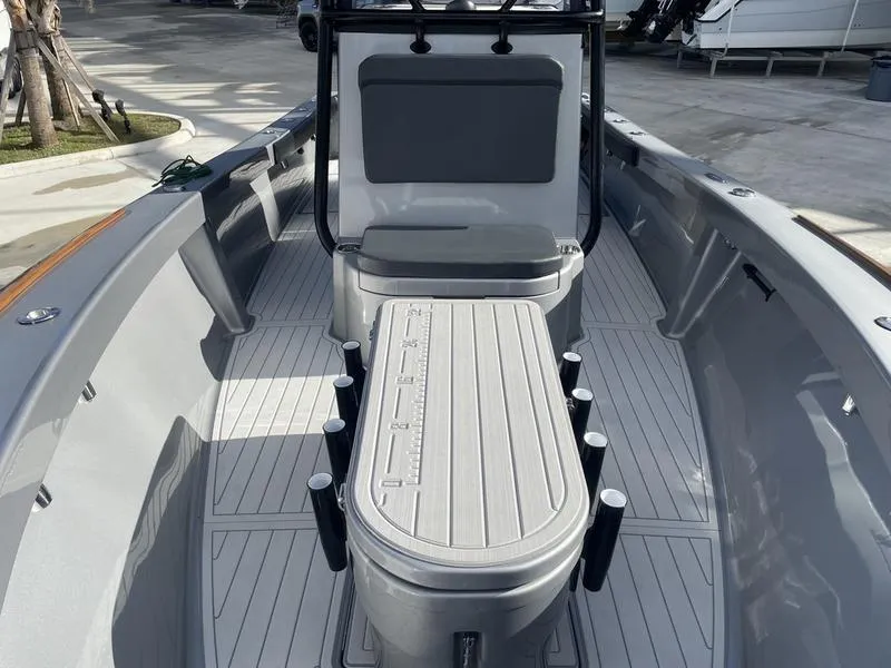Slide: The Image of 2020 Stuart 27 CC boat interior with seating and storage compartments. - 40