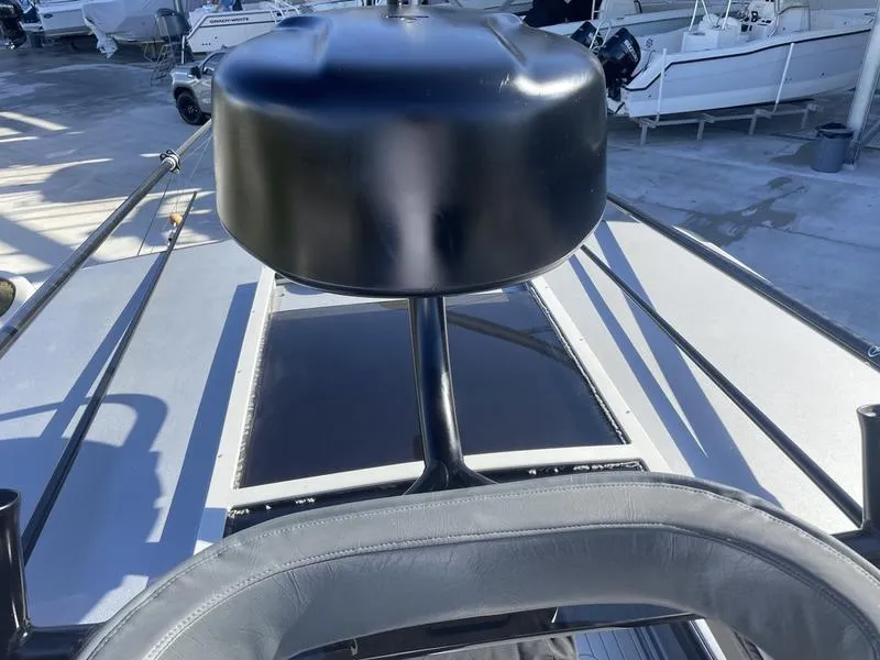 Slide: The Image of 2020 Stuart 27 CC boat deck with black radar dome and seating. - 9