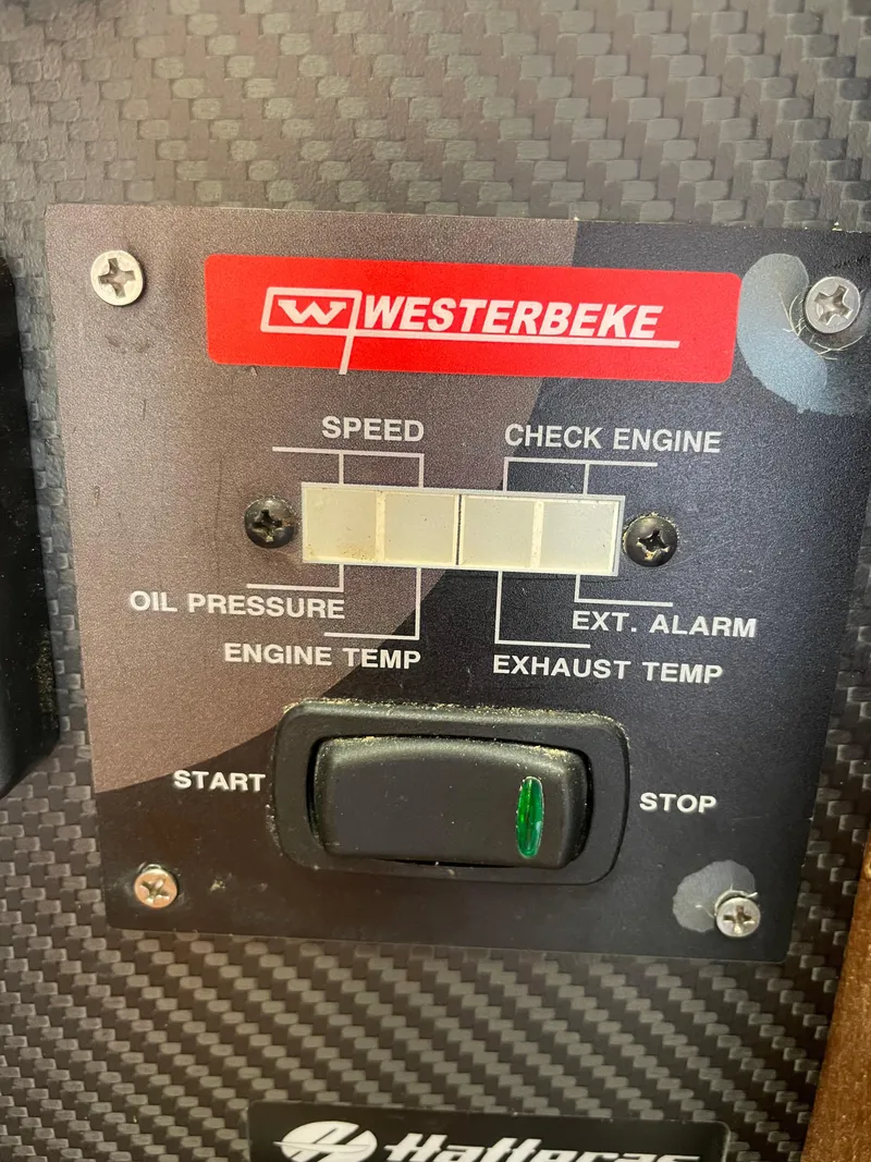 Slide: The Image of Control panel of a 1967 Hatteras 28 Cruiser with Westerbeke engine indicators. - 22