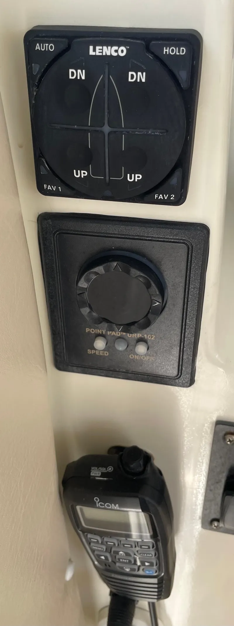 Slide: The Image of Control panel of a 1967 Hatteras 28 Cruiser with Lenco trim tab switches. - 48