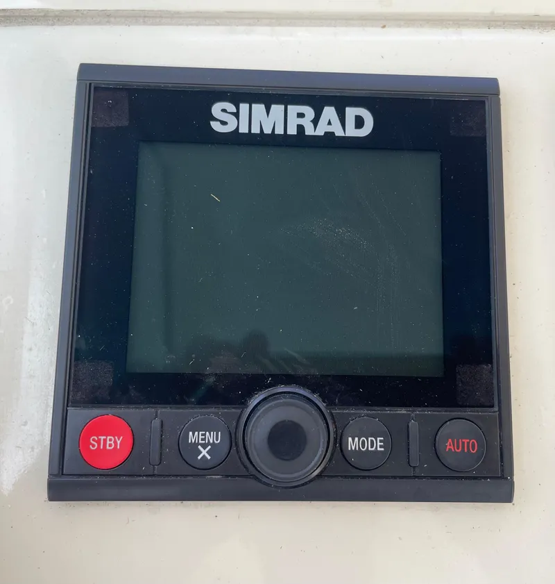 Slide: The Image of Simrad marine display on 1967 Hatteras 28 Cruiser boat dashboard. - 50