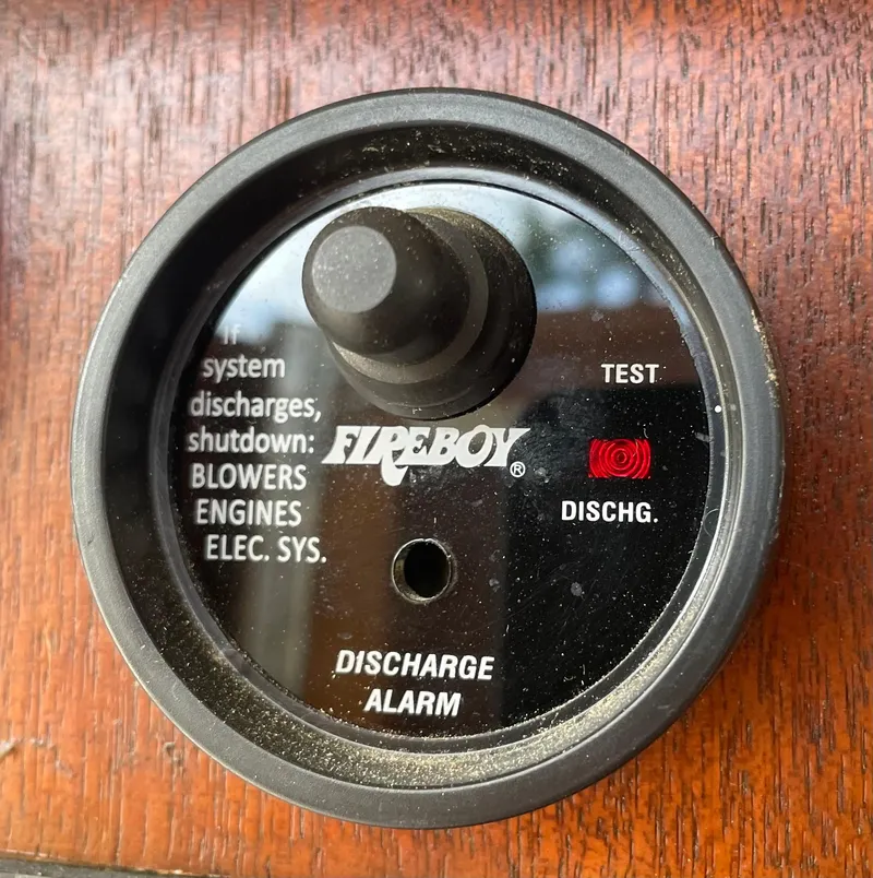 Slide: The Image of Fireboy discharge alarm on 1967 Hatteras 28 Cruiser boat dashboard. - 9