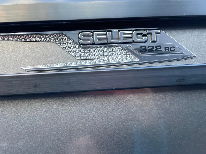 Slide: The Image of SunCatcher Select 322RC 2025 model emblem on metallic surface. - 4