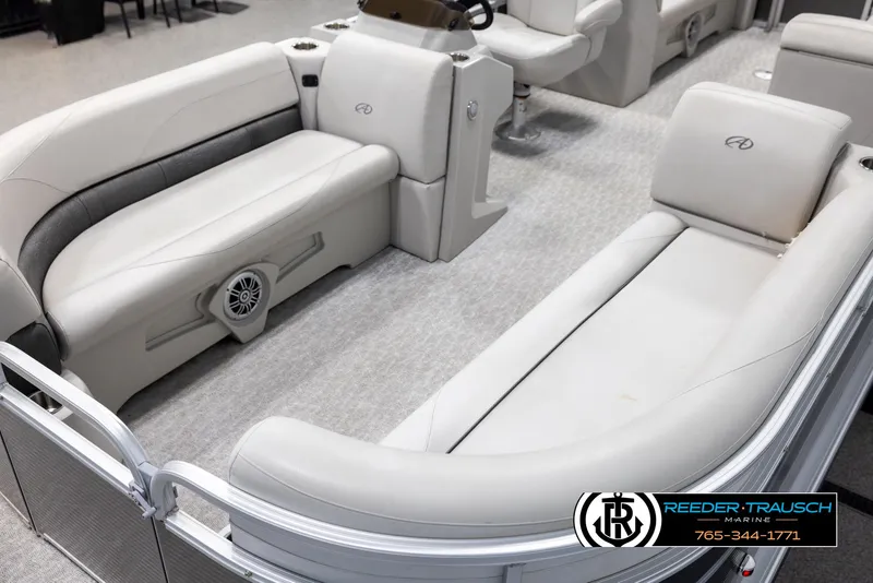 Slide: The Image of Luxurious seating in a 2021 Avalon VLS QL pontoon boat, featuring elegant white upholstery. - 10