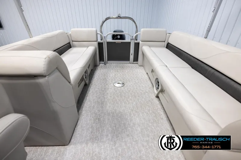 Slide: The Image of 2021 Avalon VLS QL boat interior with beige seating and carpeted floor. - 15