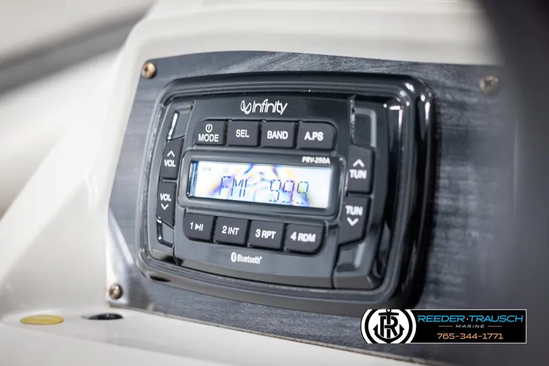 Slide: The Image of Infinity stereo system in a 2021 Avalon VLS QL boat dashboard, displaying FM radio. - 27