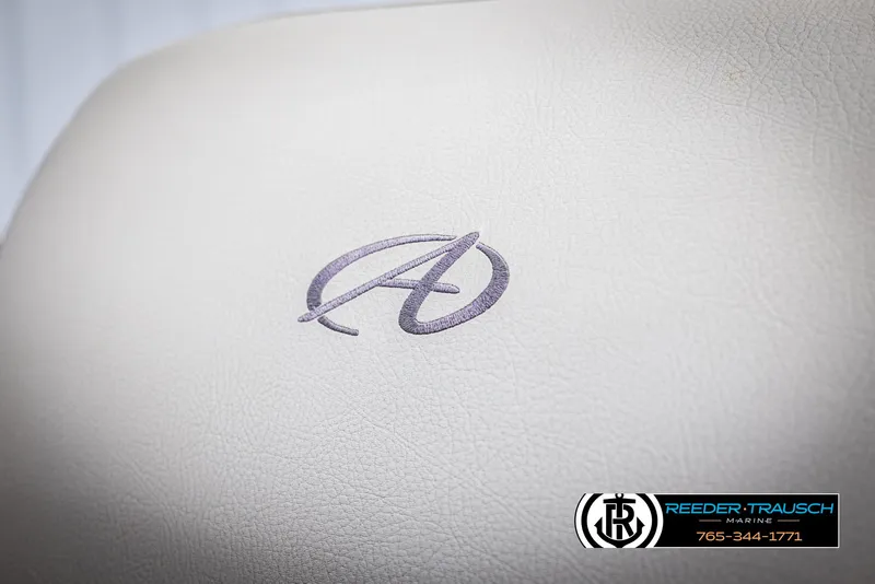 Slide: The Image of 2021 Avalon VLS QL logo on light upholstery, Reeder-Trausch Marine branding. - 35