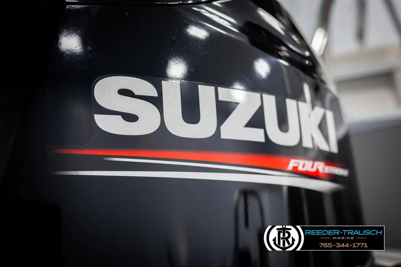 Slide: The Image of Close-up of Suzuki Four Stroke engine on 2021 Avalon VLS QL. - 40