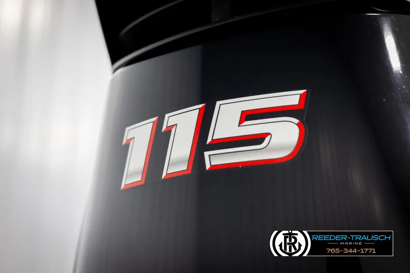 Slide: The Image of Avalon VLS QL 2021 engine with "115" decal, Reeder-Trausch Marine branding. - 41