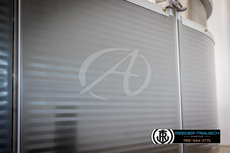 Slide: The Image of 2021 Avalon VLS QL boat panel with logo and Reeder-Trausch Marine branding. - 43