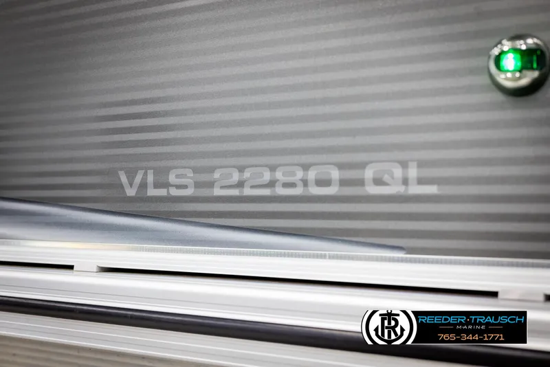 Slide: The Image of 2021 Avalon VLS QL boat detail with branding and model number. - 44