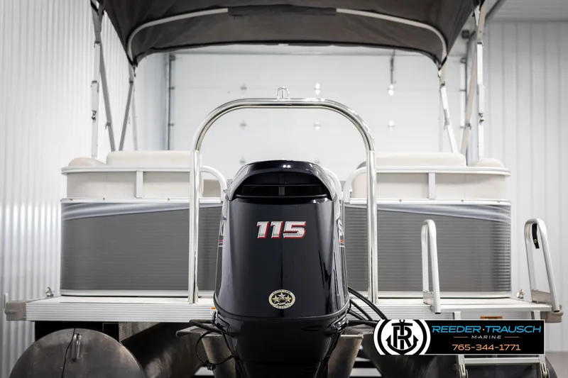 Slide: The Image of 2021 Avalon VLS QL pontoon boat with 115 HP engine in showroom. - 7