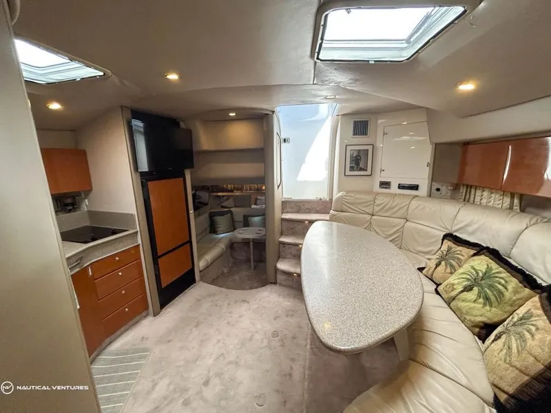 Slide: The Image of Luxurious interior of a 2002 Formula 41 PC yacht with plush seating and modern amenities. - 20