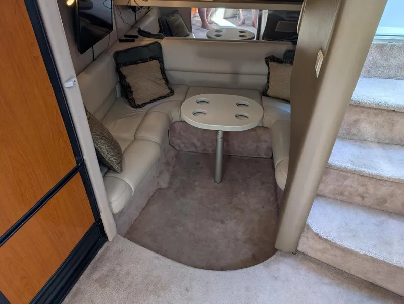 Slide: The Image of 2002 Formula 41 PC yacht interior with cozy seating and table. - 26