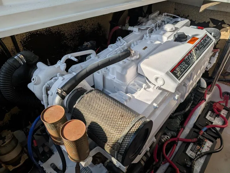 Slide: The Image of 2002 Formula 41 PC engine, detailed view with components and wiring. - 36