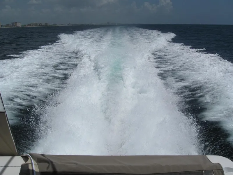 Slide: The Image of Wake of a 2002 Formula 41 PC boat cruising on open water. - 37