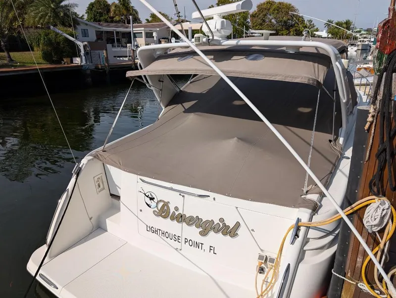 Slide: The Image of 2002 Formula 41 PC boat docked, covered, in Lighthouse Point, FL marina. - 5