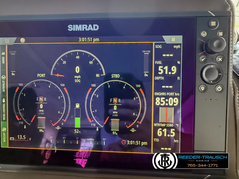 Slide: The Image of Simrad display on 2021 Four Winns Vista 355 Coupe OB showing engine and fuel data. - 12