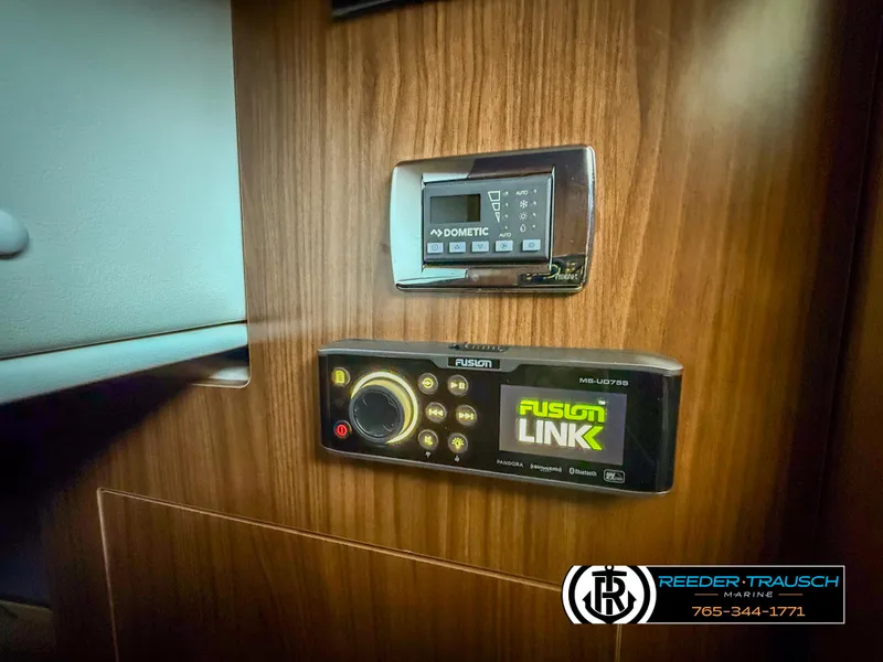 Slide: The Image of Control panel in 2021 Four Winns Vista 355 Coupe OB boat interior. - 20