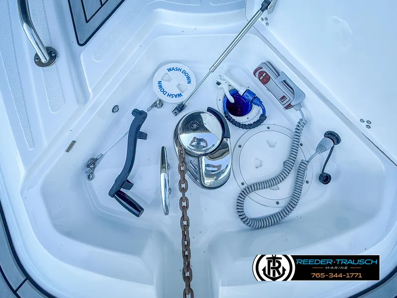 Slide: The Image of 2021 Four Winns Vista 355 Coupe OB boat deck with anchor chain and marine equipment. - 34