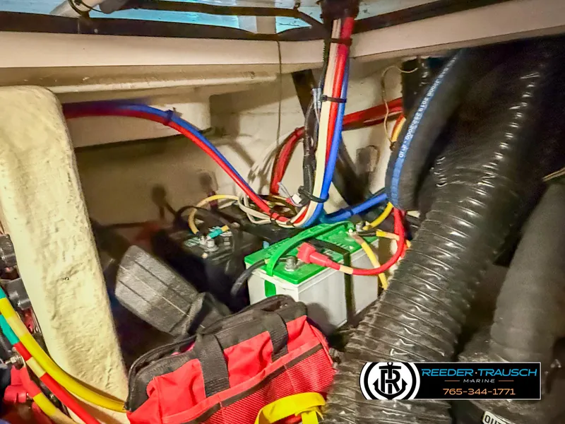 Slide: The Image of 2021 Four Winns Vista 355 Coupe OB engine compartment with wiring and equipment. - 36