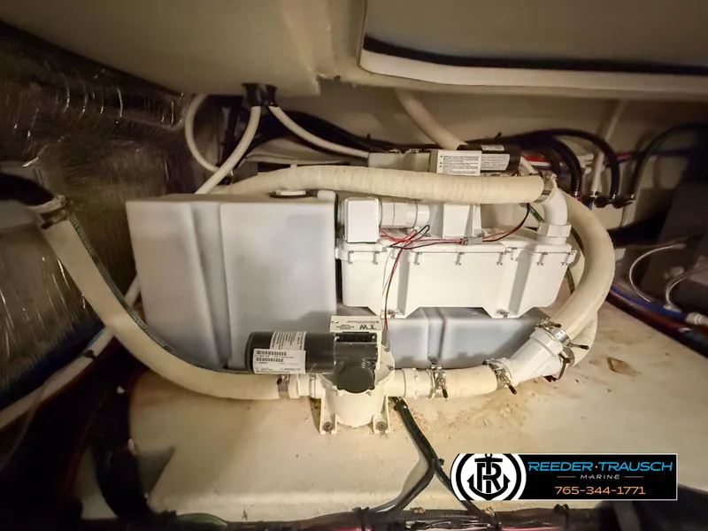 Slide: The Image of Engine compartment of a 2021 Four Winns Vista 355 Coupe OB boat. - 38