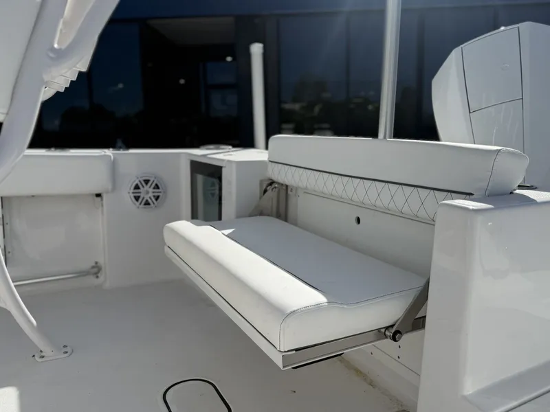 Slide: The Image of Sportsman Open 212 Center Console 2025 with white seating area. - 21