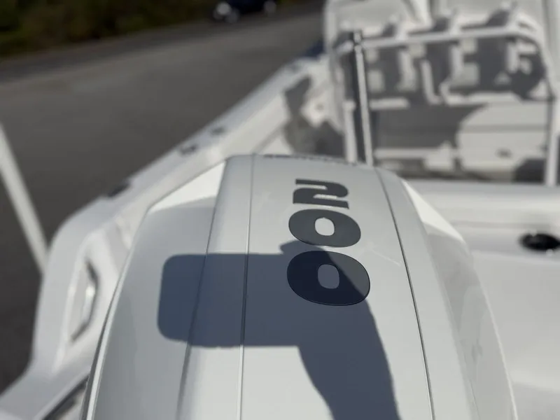 Slide: The Image of Close-up of a 2025 Sportsman Open 212 Center Console boat engine. - 23