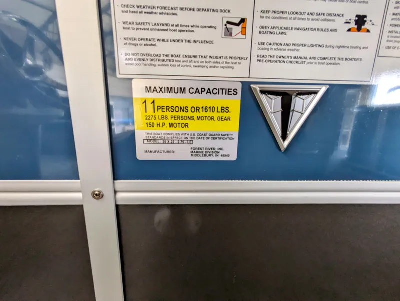 Slide: The Image of 2024 Trifecta 22TRFC LE 2.75 capacity label, maximum 11 persons or 1610 lbs. - 18