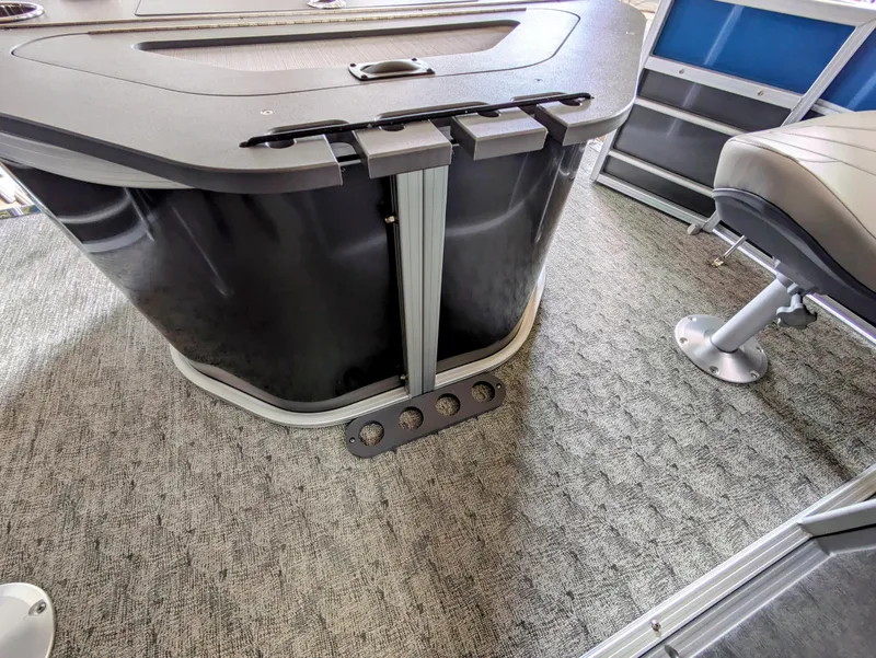 Slide: The Image of 2024 Trifecta 22TRFC LE 2.75 boat interior with modern seating and carpeted flooring. - 35