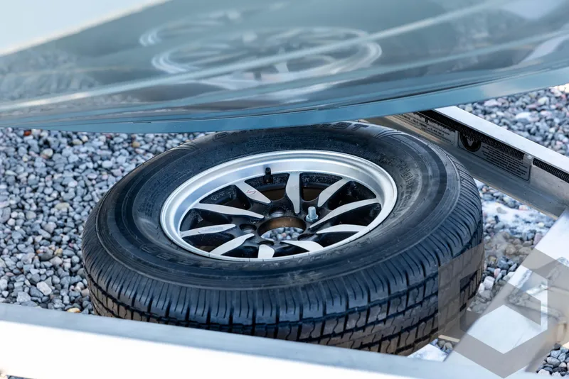 Slide: The Image of Spare tire mounted on a G3 Bay 21 GX boat trailer, 2025 model. - 11