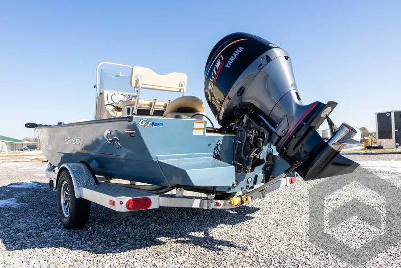 Slide: The Image of 2025 G3 Bay 21 GX boat with Yamaha outboard motor on a trailer. - 19