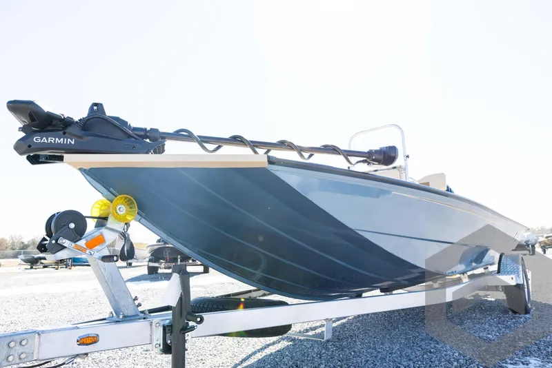 Slide: The Image of 2025 G3 Bay 21 GX boat on trailer, featuring Garmin equipment. - 24