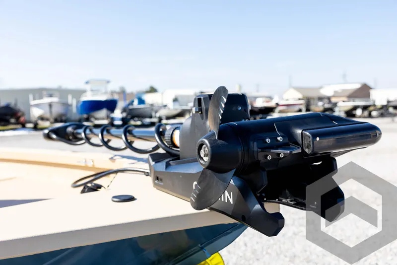 Slide: The Image of 2025 G3 Bay 21 GX boat with advanced trolling motor in a marina setting. - 26