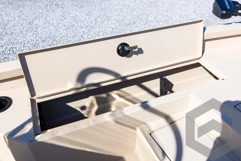Slide: The Image of 2025 G3 Bay 21 GX boat storage compartment with open lid, showcasing interior space. - 31