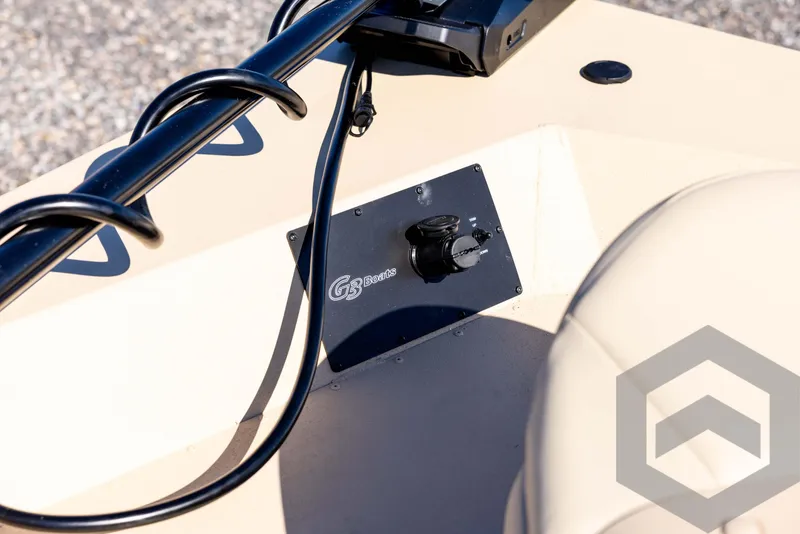 Slide: The Image of 2025 G3 Bay 21 GX boat control panel with steering wheel detail. - 36