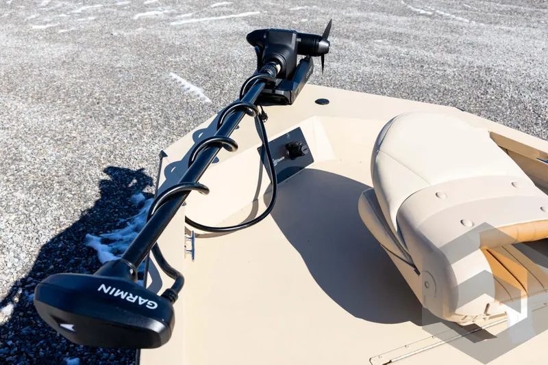 Slide: The Image of 2025 G3 Bay 21 GX boat with Garmin trolling motor on deck. - 37