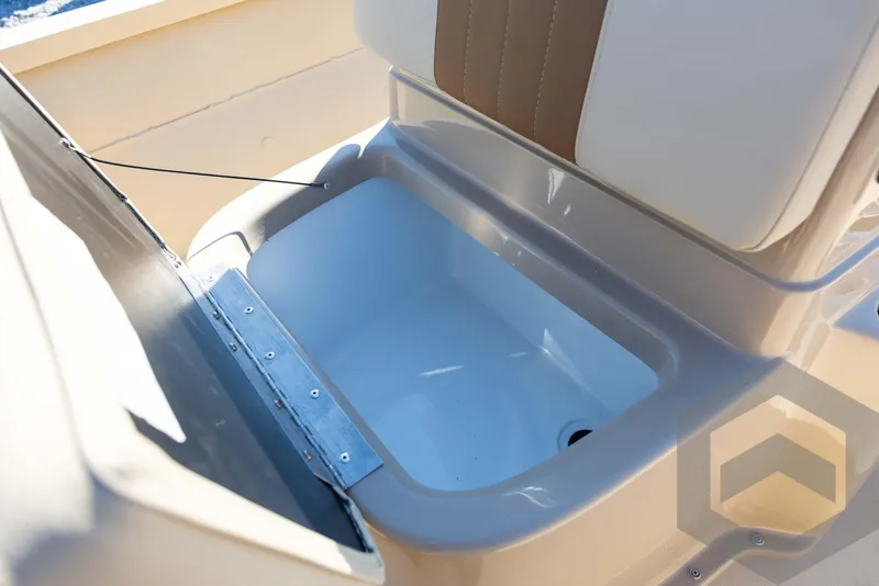 Slide: The Image of 2025 G3 Bay 21 GX boat storage compartment with open lid, showcasing interior space. - 39