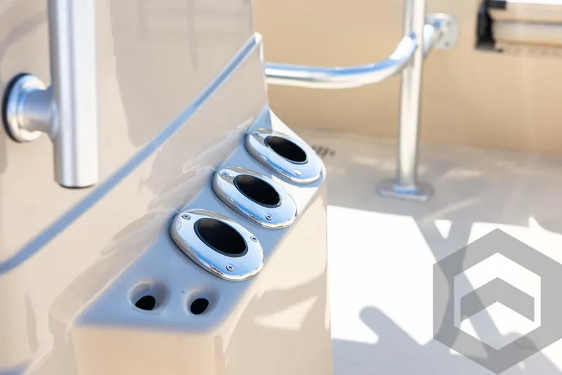 Slide: The Image of 2025 G3 Bay 21 GX boat interior with rod holders and sleek design. - 41