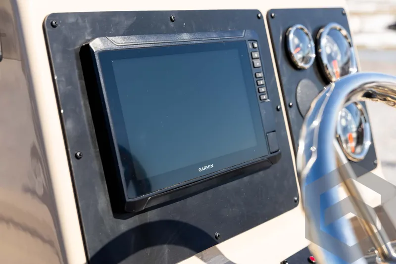 Slide: The Image of Dashboard of 2025 G3 Bay 21 GX boat with Garmin display and gauges. - 43