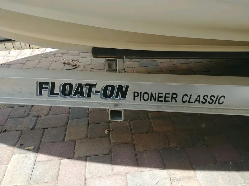 Slide: The Image of Trailer for 2020 Bulls Bay 230 CC boat, labeled "Float-On Pioneer Classic." - 9