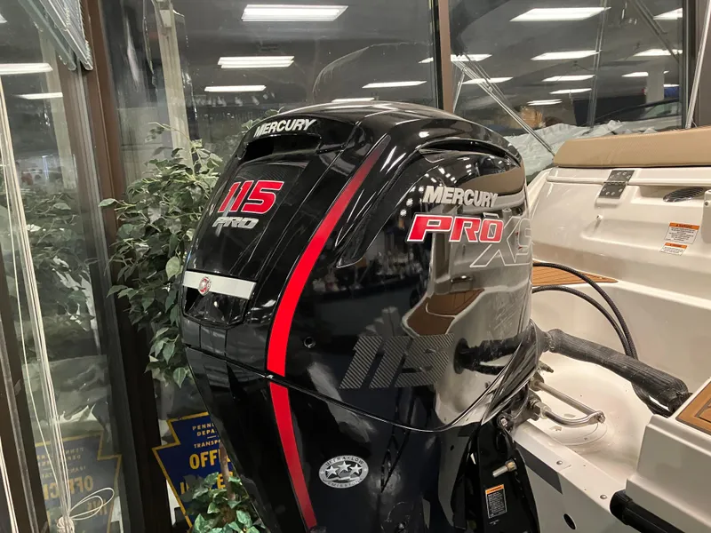 Slide: The Image of 2024 Bayliner VR5 Bowrider OB with Mercury 115 Pro outboard motor in showroom. - 3