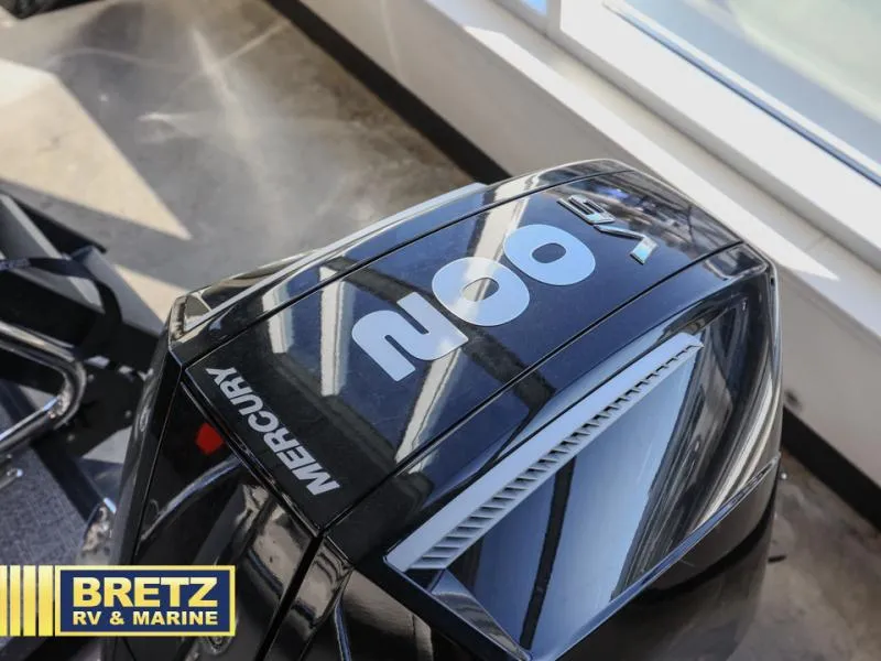 Slide: The Image of Mercury 200 HP engine on 2025 Cabrio Ultra-Lounge 22UC at Bretz RV & Marine showroom. - 11