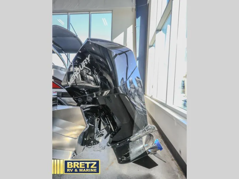 Slide: The Image of 2025 Cabrio Ultra-Lounge 22UC with Mercury outboard motor at Bretz RV & Marine showroom. - 12