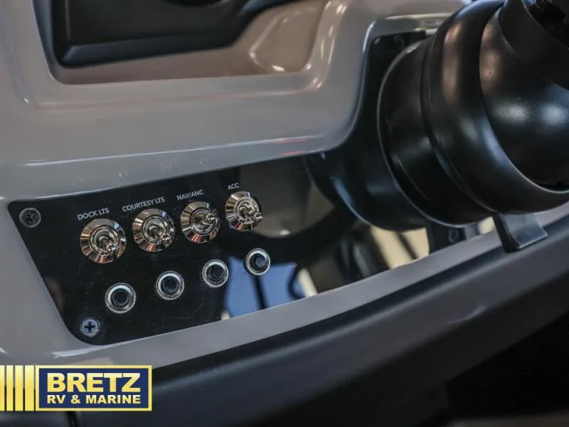 Slide: The Image of Control panel of 2025 Cabrio Ultra-Lounge 22UC with labeled switches and ports. - 16