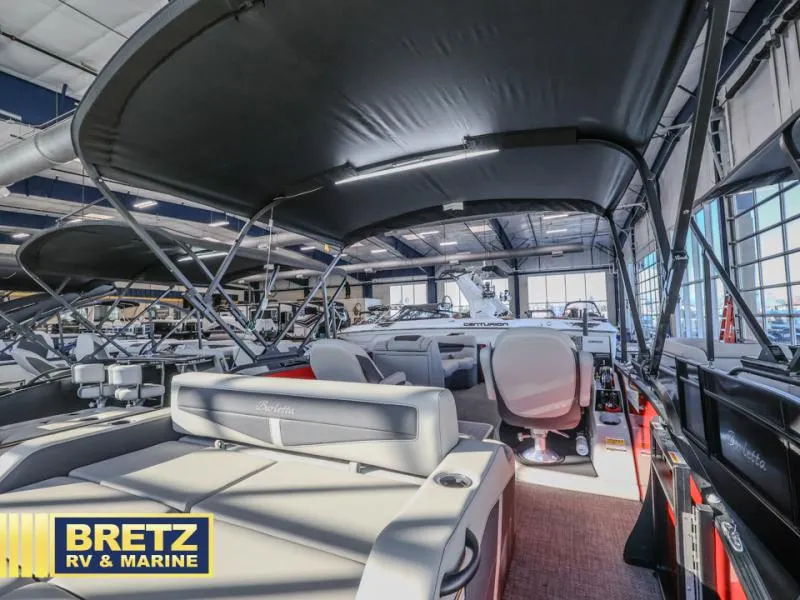 Slide: The Image of 2025 Cabrio Ultra-Lounge 22UC boat interior at Bretz RV & Marine showroom. - 19