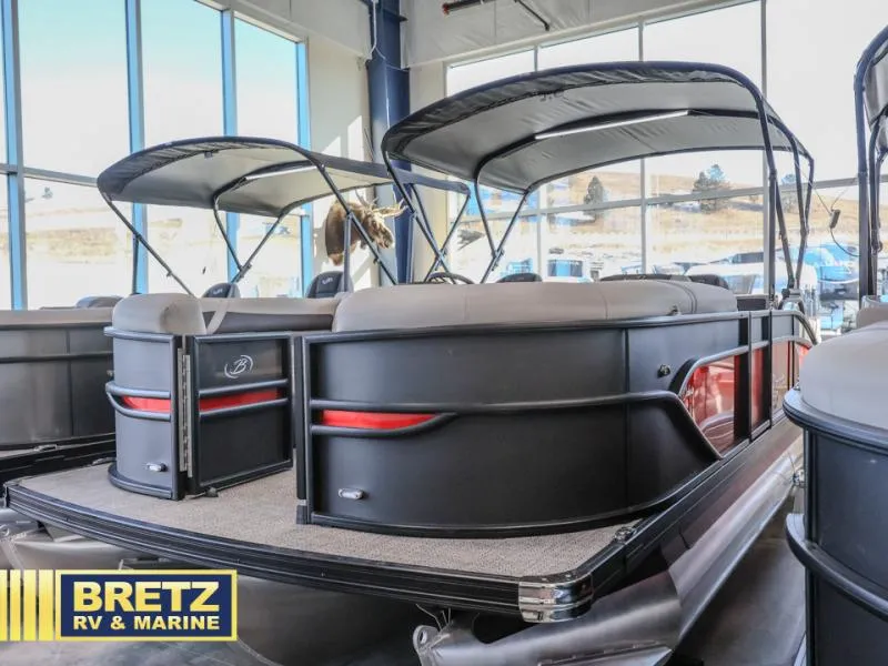 Slide: The Image of 2025 Cabrio Ultra-Lounge 22UC pontoon boat displayed at Bretz RV & Marine showroom. - 4