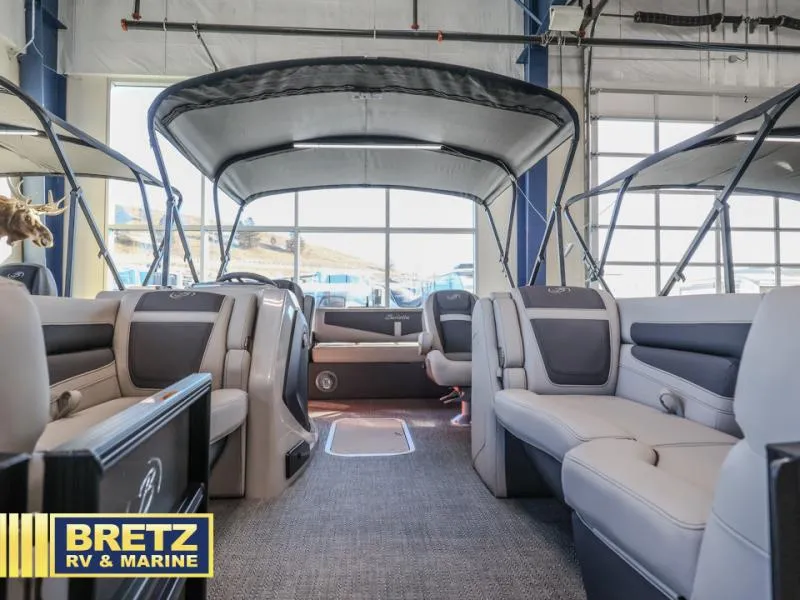 Slide: The Image of 2025 Cabrio Ultra-Lounge 22UC interior, featuring spacious seating and modern design at Bretz RV & Marine. - 5